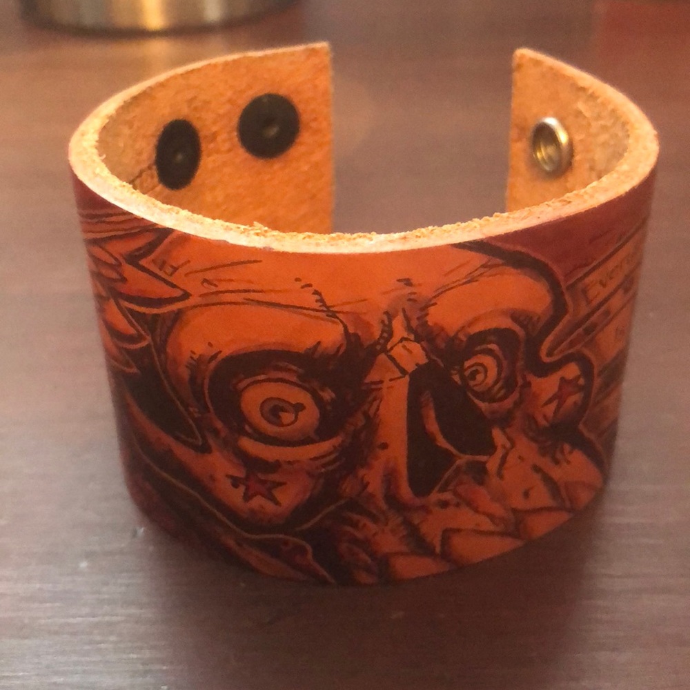 Jon Wye leather skull cuff